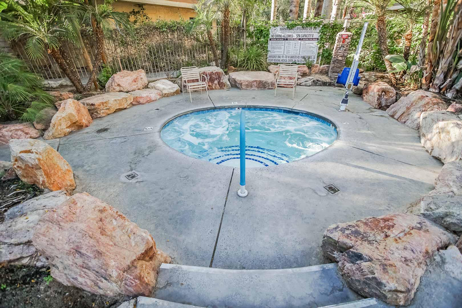 A peaceful outdoor Jacuzzi at VRI's Palm Springs Tennis Club in California.